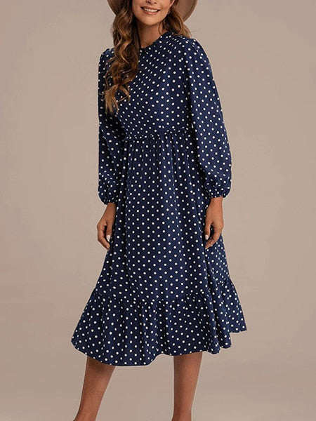 Robe à pois bleu marine