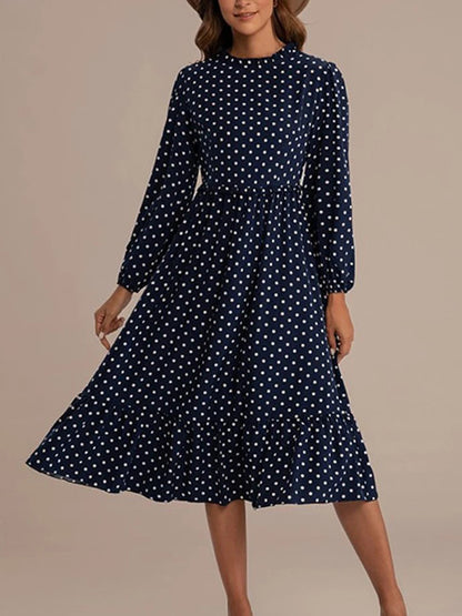 Robe à pois bleu marine