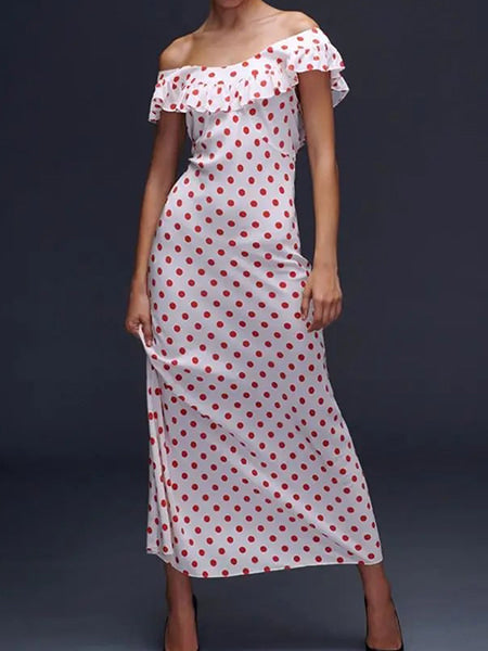 Robe blanche à pois rouge