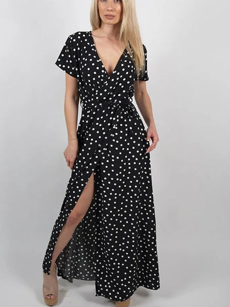 Robe noire pois blanc