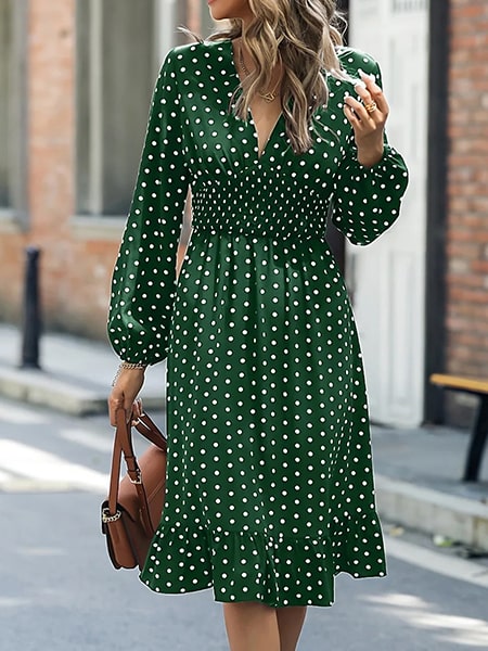 Robe verte à pois blanc