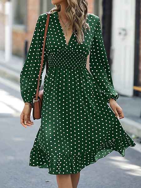 Robe verte à pois blanc