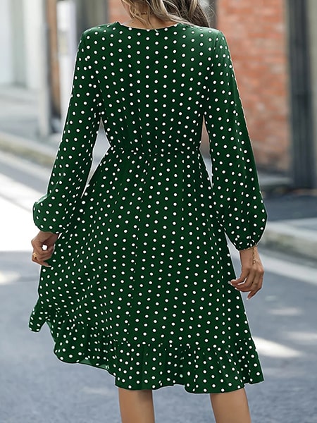 Robe verte à pois blanc